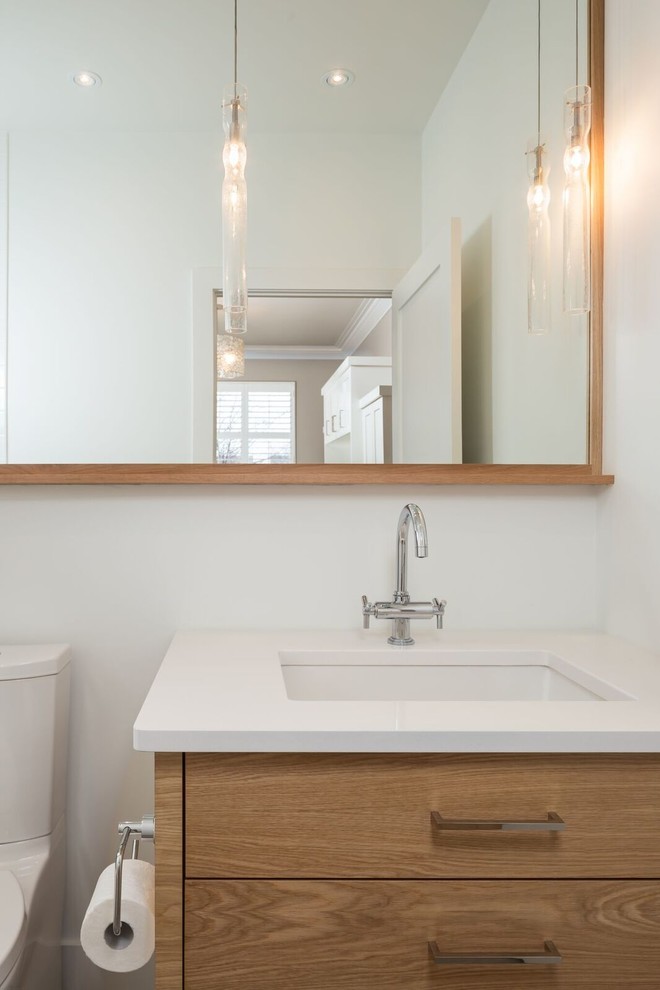 Design ideas for a mid-sized transitional 3/4 bathroom in Toronto with flat-panel cabinets, medium wood cabinets, an alcove shower, a two-piece toilet, gray tile, white tile, subway tile, white walls, an undermount sink, engineered quartz benchtops and a shower curtain.