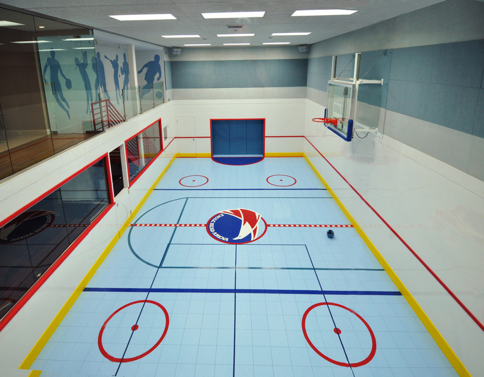 Photo of a large traditional indoor sport court in Manchester with multi-coloured walls, vinyl floors and multi-coloured floor.