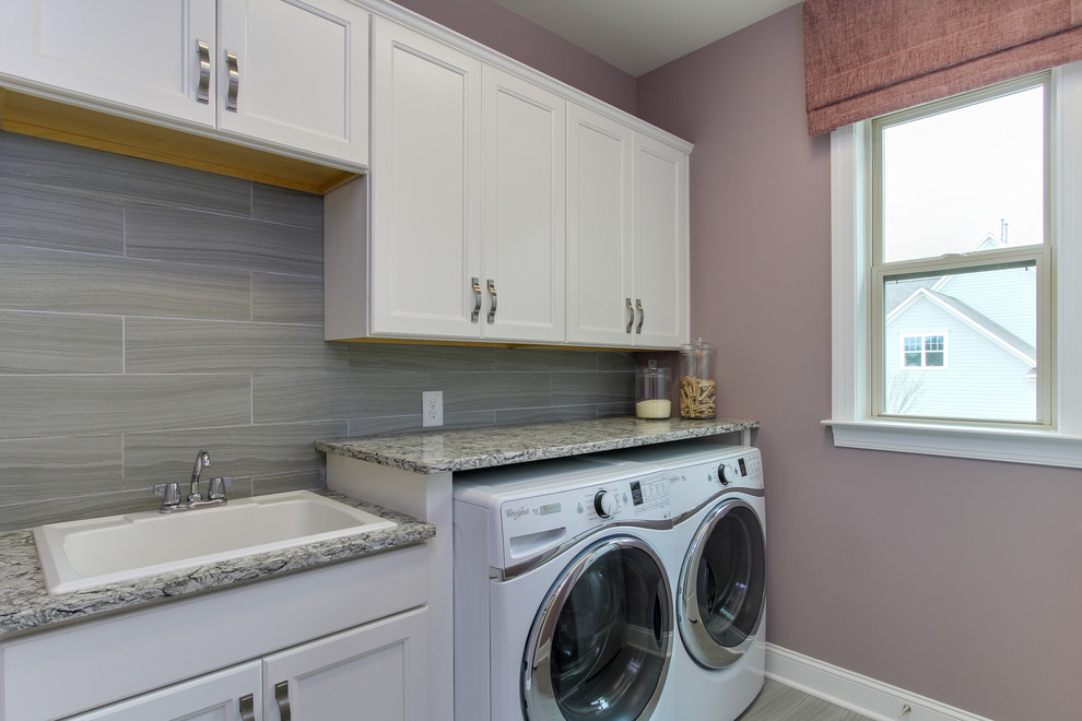 Photo of a contemporary laundry room in Raleigh.