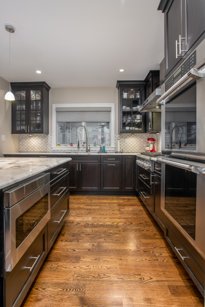 Example of a transitional kitchen design in New York