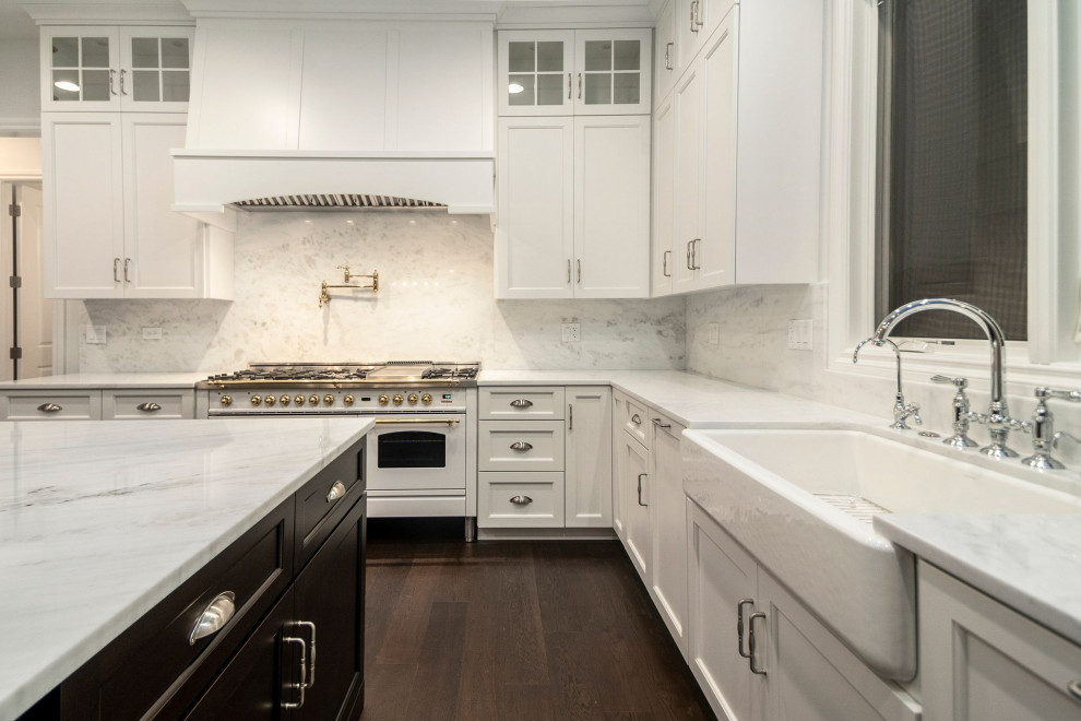 Eat-in kitchen - mid-sized l-shaped dark wood floor and brown floor eat-in kitchen idea in Chicago with white cabinets, granite countertops, stainless steel appliances and an island