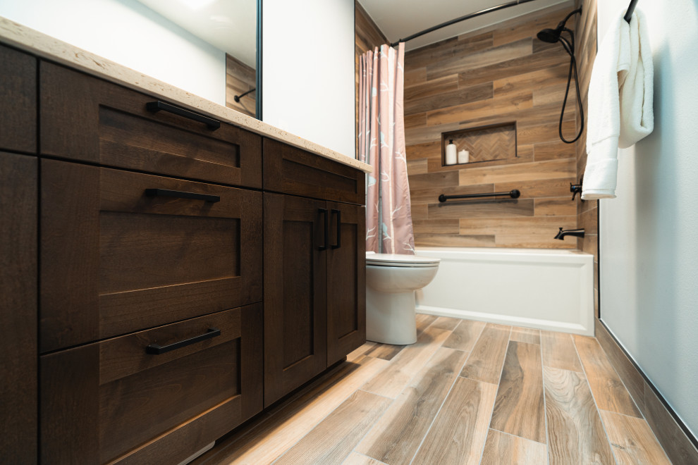 Inspiration for a mid-sized country kids bathroom in Seattle with shaker cabinets, brown cabinets, a freestanding tub, a curbless shower, porcelain floors, an open shower, a niche, a double vanity and a built-in vanity.
