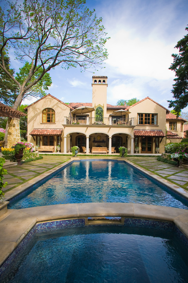 Inspiration for a large traditional backyard rectangular pool in Dallas.
