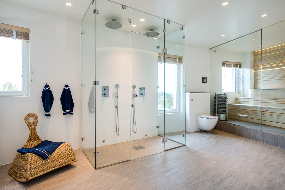 Large contemporary master bathroom in Stockholm with a curbless shower, a two-piece toilet, white walls and ceramic floors.