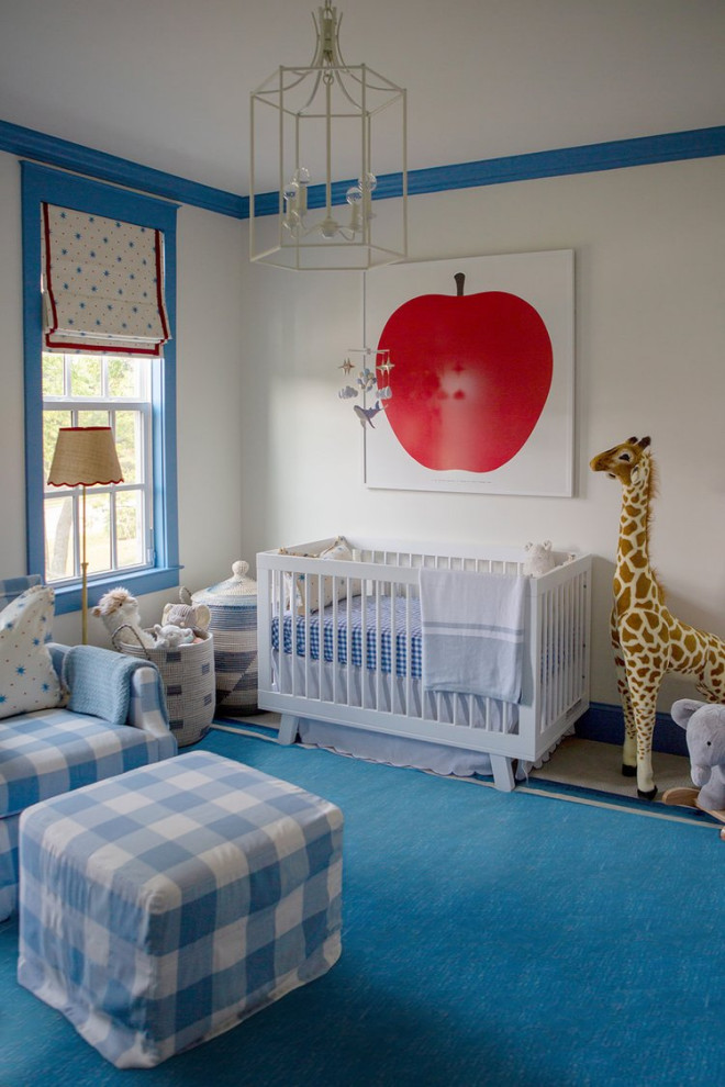 Transitional nursery in Nashville with white walls, carpet and blue floor for boys.