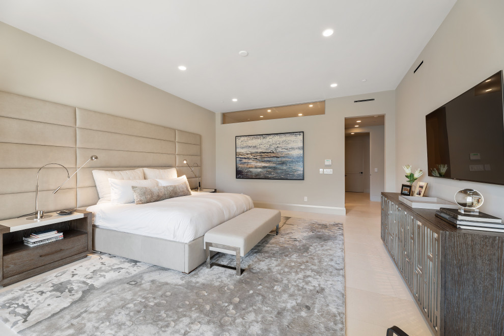 Contemporary master bedroom in Salt Lake City with beige walls, no fireplace and beige floor.