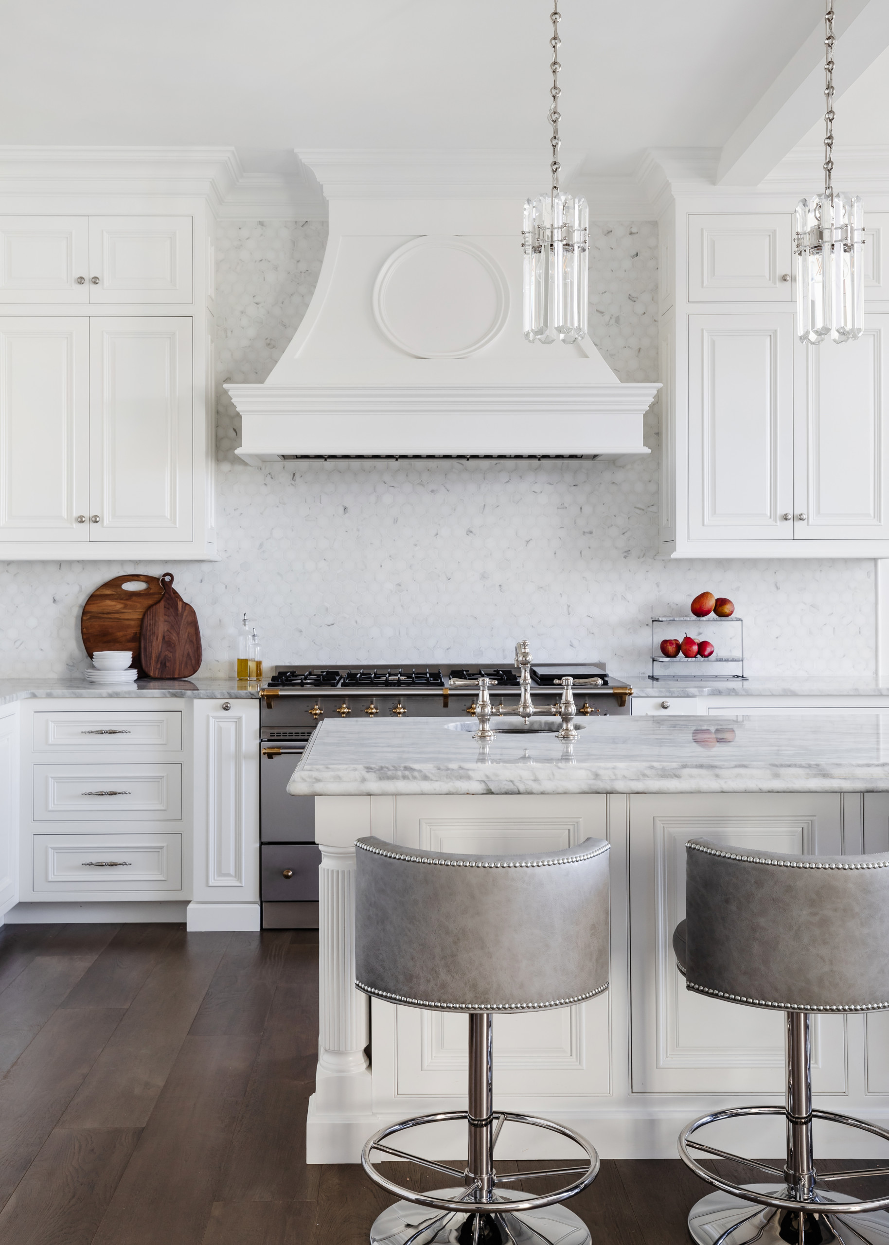 Classic Kitchens & Interiors - A soft taupe-gray stain on the perimeter and  off-white on the island gives this kitchen a coastal feel. The basket weave  tile backsplash goes to the ceiling