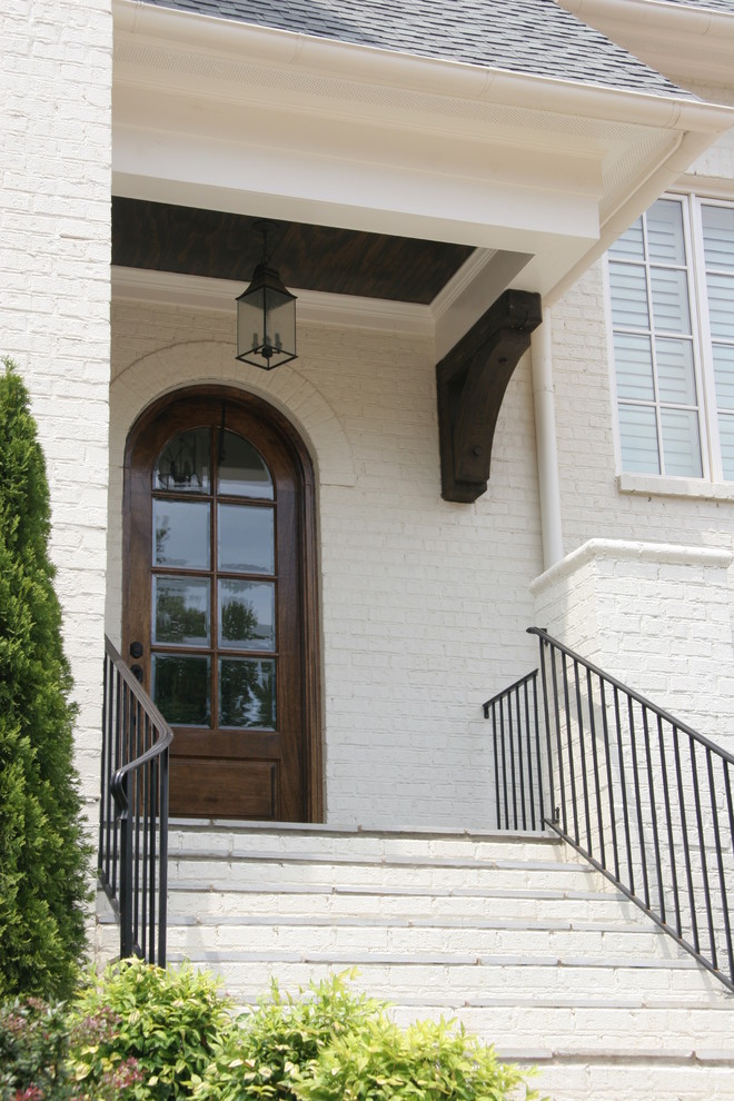 Mountain style home design photo in Raleigh