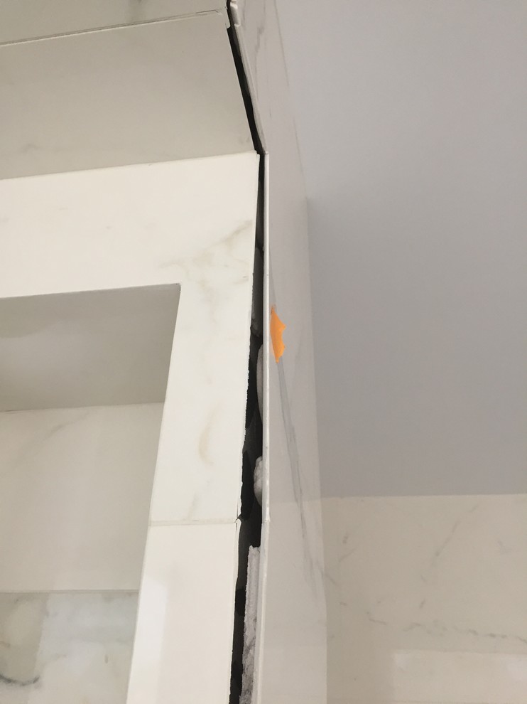 Ceramic tile separating from wall?