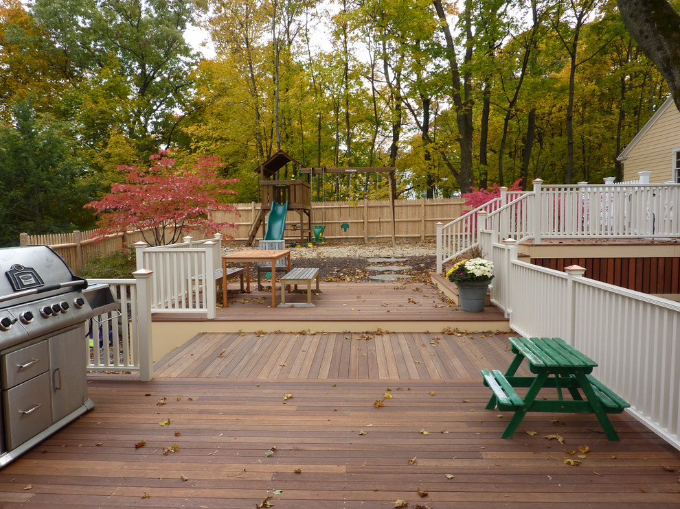 Photo of a traditional patio in Boston with decking.