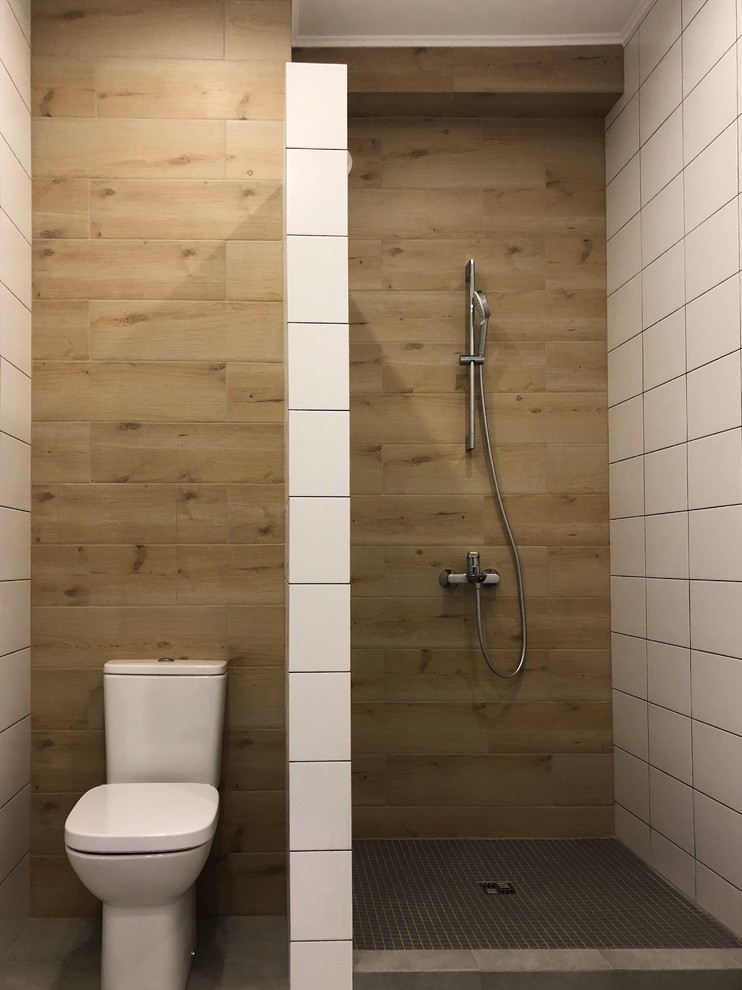 This is an example of a small contemporary bathroom in Other with light wood cabinets, a one-piece toilet, white tile, porcelain tile, white walls, mosaic tile floors, tile benchtops and grey floor.