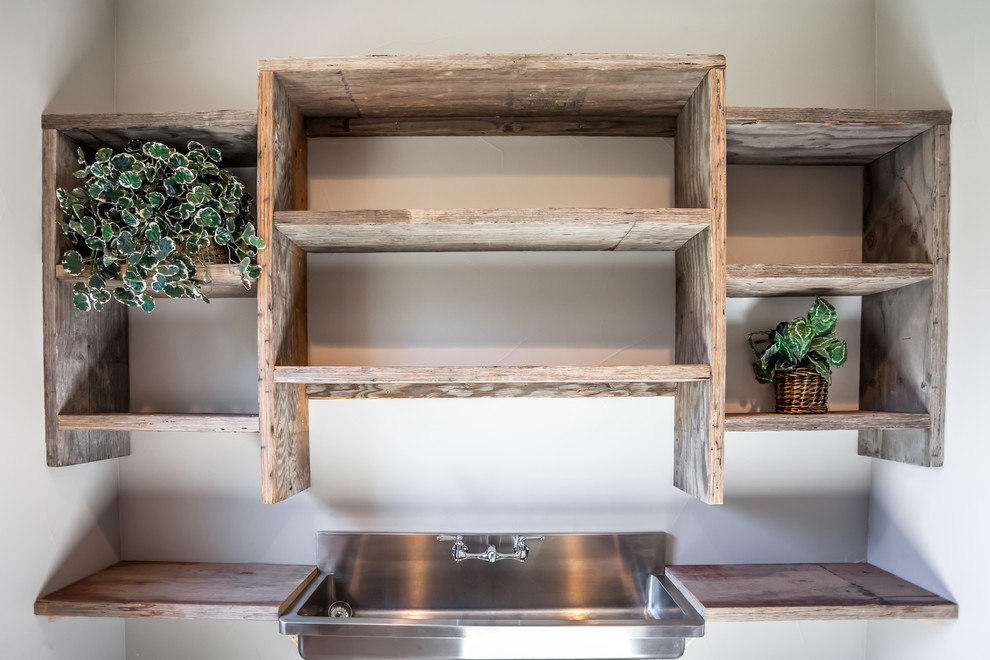 Example of a mountain style home design design in Denver