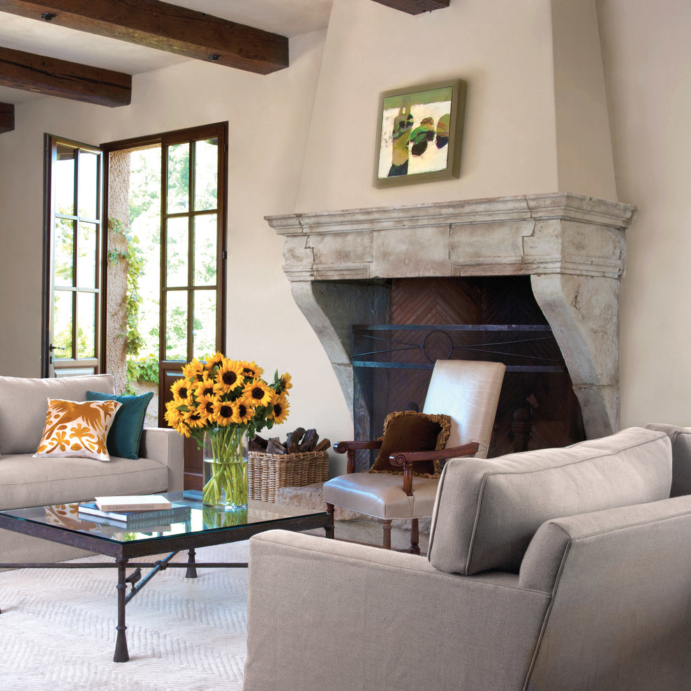 Design ideas for a large mediterranean formal enclosed living room in San Francisco with beige walls, carpet, a standard fireplace, a stone fireplace surround, no tv and white floor.