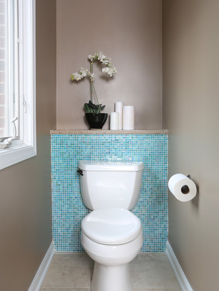 Photo of a small contemporary powder room in Chicago with a two-piece toilet, blue tile, mosaic tile and beige walls.