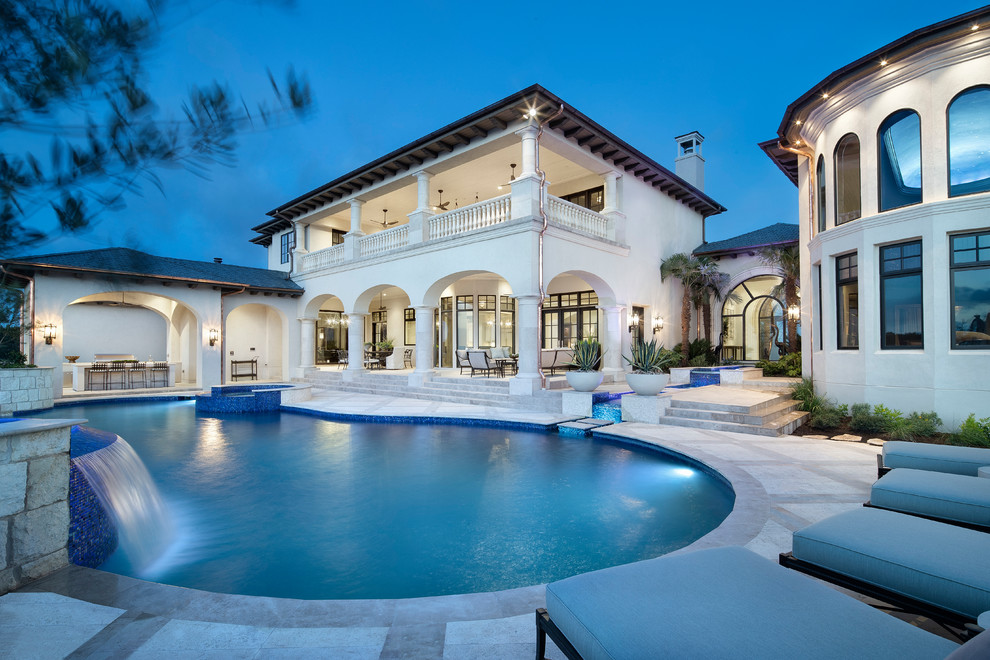 Pool fountain - large transitional backyard infinity pool fountain idea in Austin