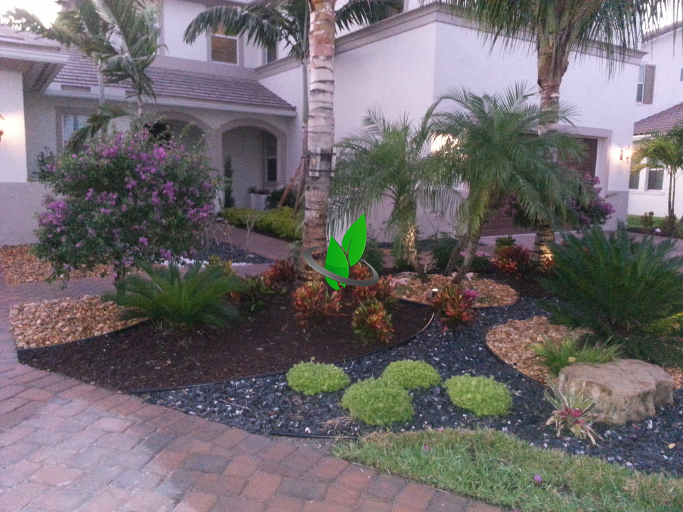 Photo of a front yard gravel landscaping.