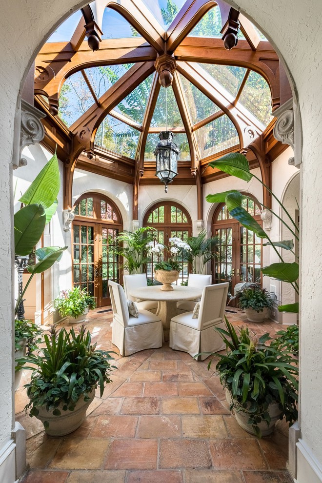 Inspiration for a timeless brick floor sunroom remodel in Atlanta with a glass ceiling
