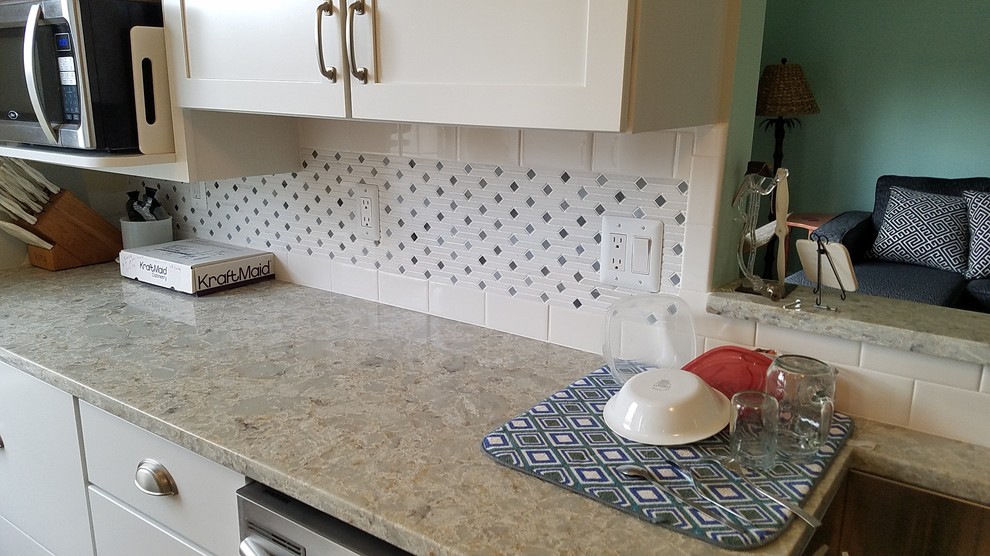 Example of a small transitional kitchen design in Detroit with white backsplash and subway tile backsplash