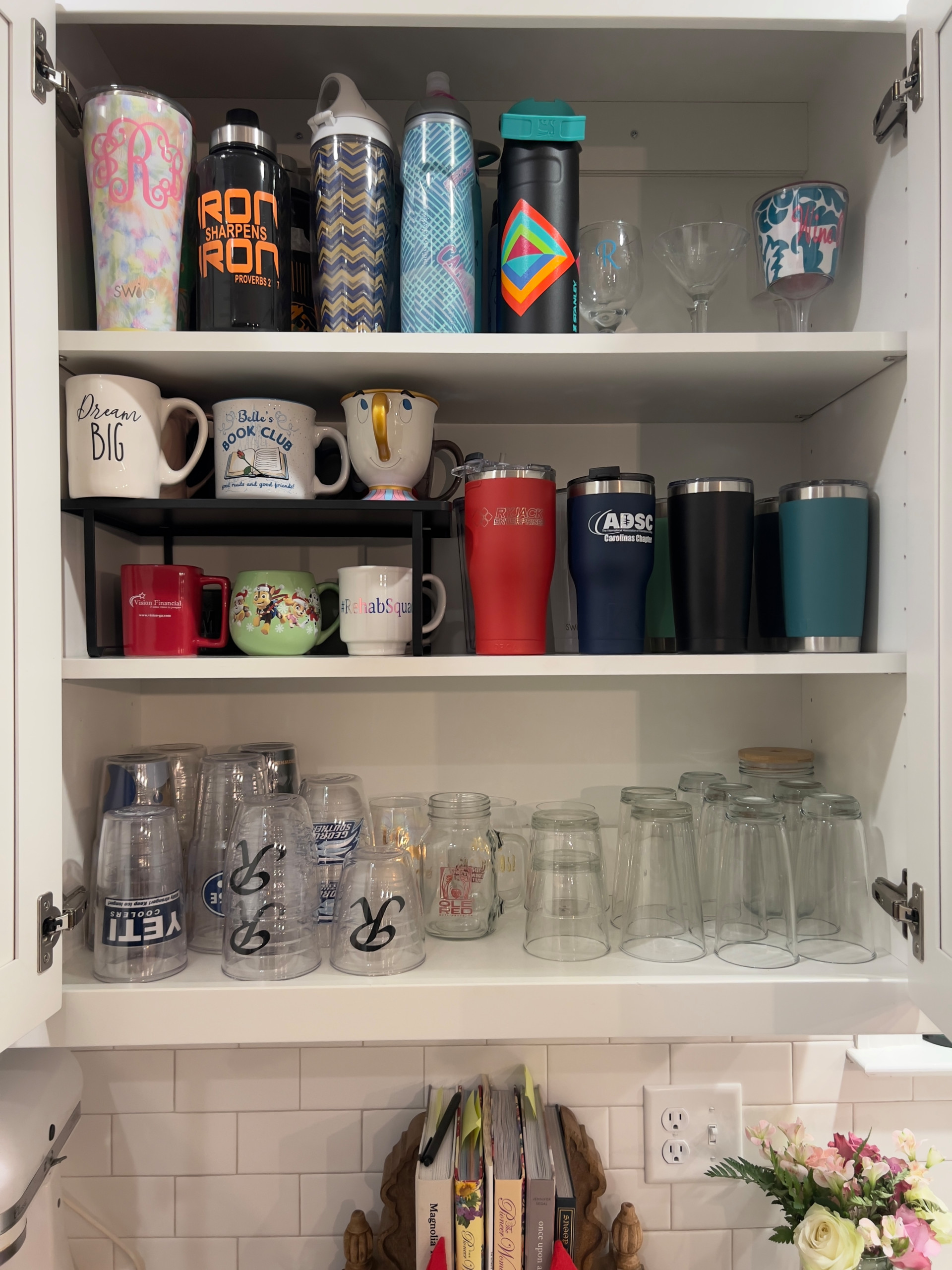 Kitchen Cabinet with drinkware and sports bottles