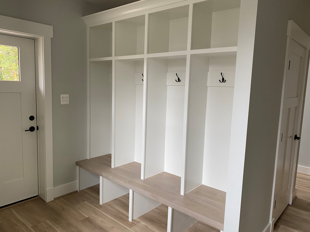 Mudroom - large transitional vinyl floor and gray floor mudroom idea in DC Metro with gray walls