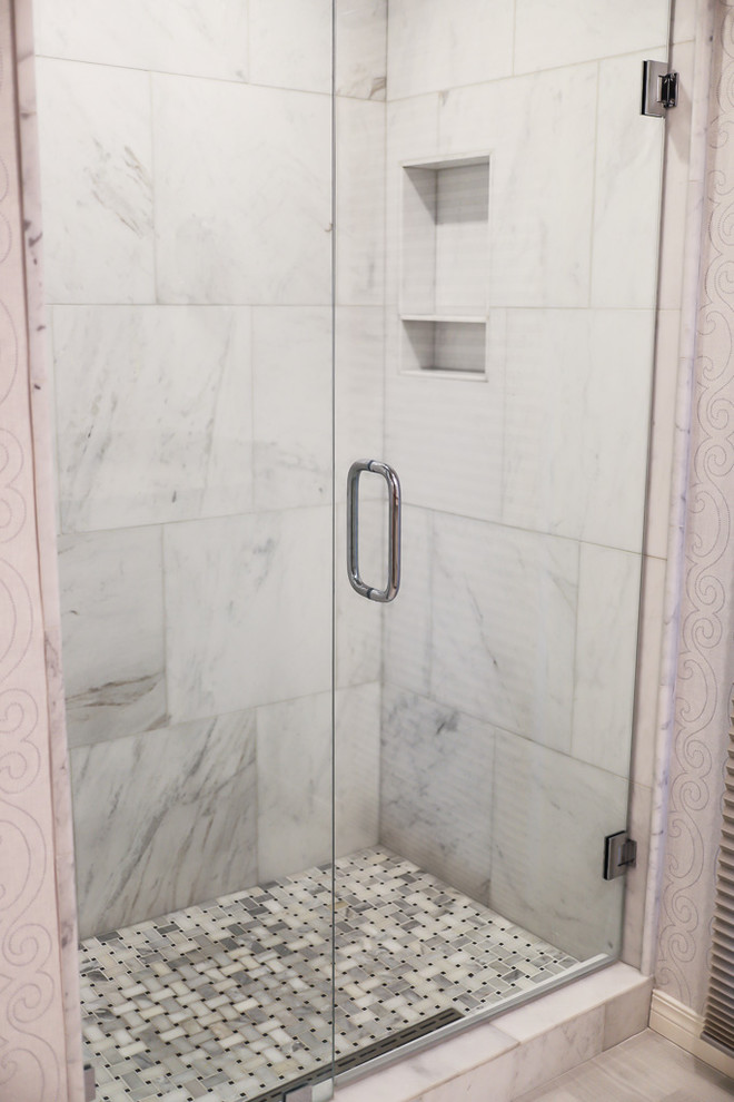 Example of a mid-sized transitional master white tile and marble tile ceramic tile and gray floor alcove bathtub design with gray walls, beaded inset cabinets, white cabinets, a two-piece toilet, an undermount sink, quartzite countertops and a hinged shower door