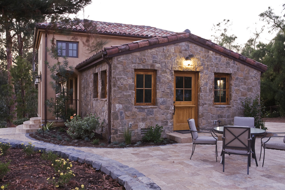 Inspiration for a mediterranean exterior in San Francisco with stone veneer.