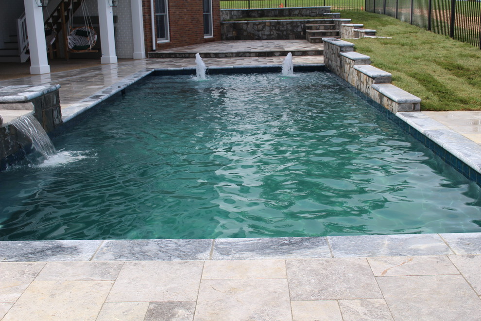 Small mountain style backyard stone and rectangular natural hot tub photo in DC Metro