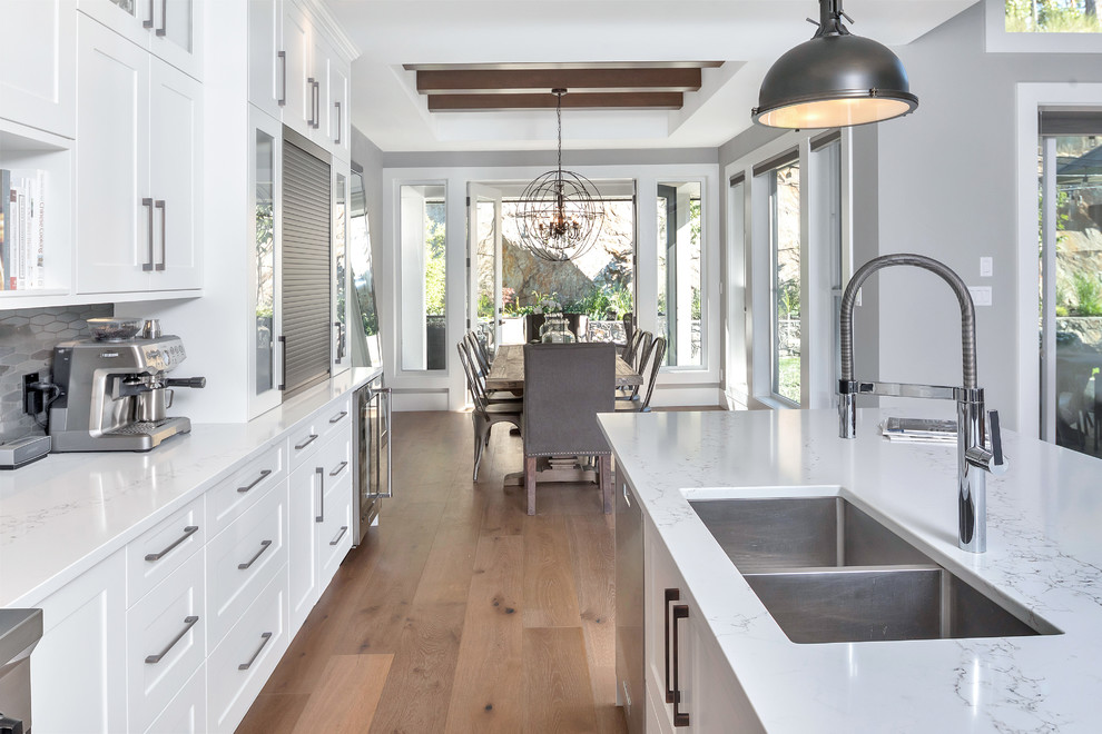 Transitional dark wood floor and brown floor kitchen photo
