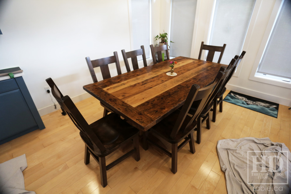 Example of a mountain style dining room design in Toronto
