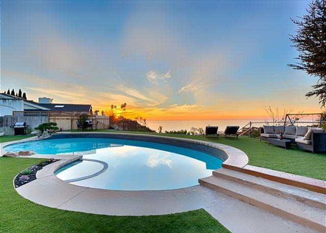 Mid-sized beach style kidney-shaped pool in San Diego.