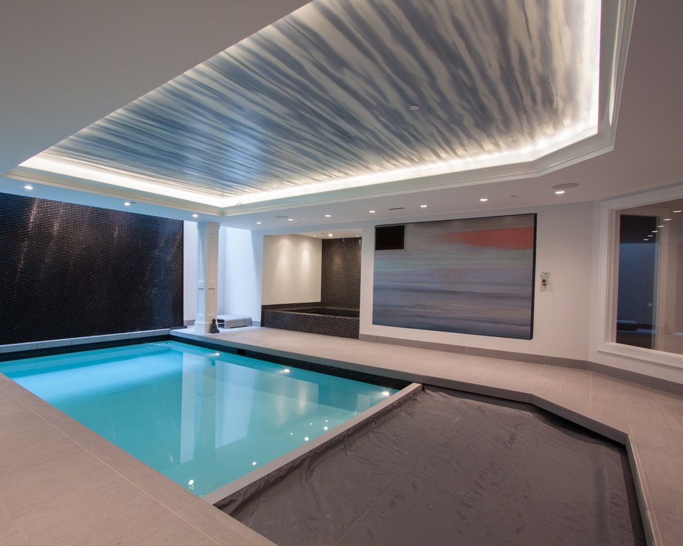 Eclectic custom-shaped indoor hot tub photo in Vancouver