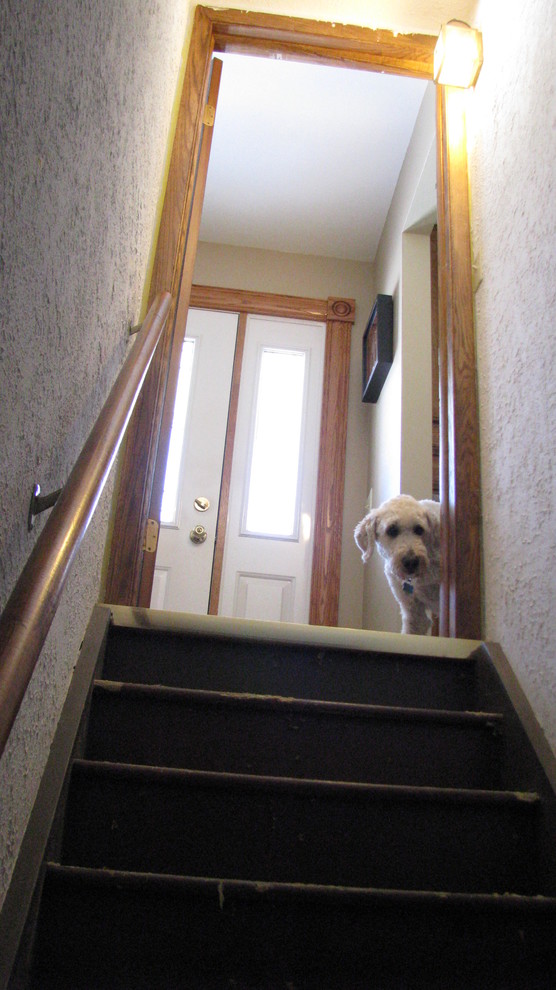 Steep, narrow basement stairs