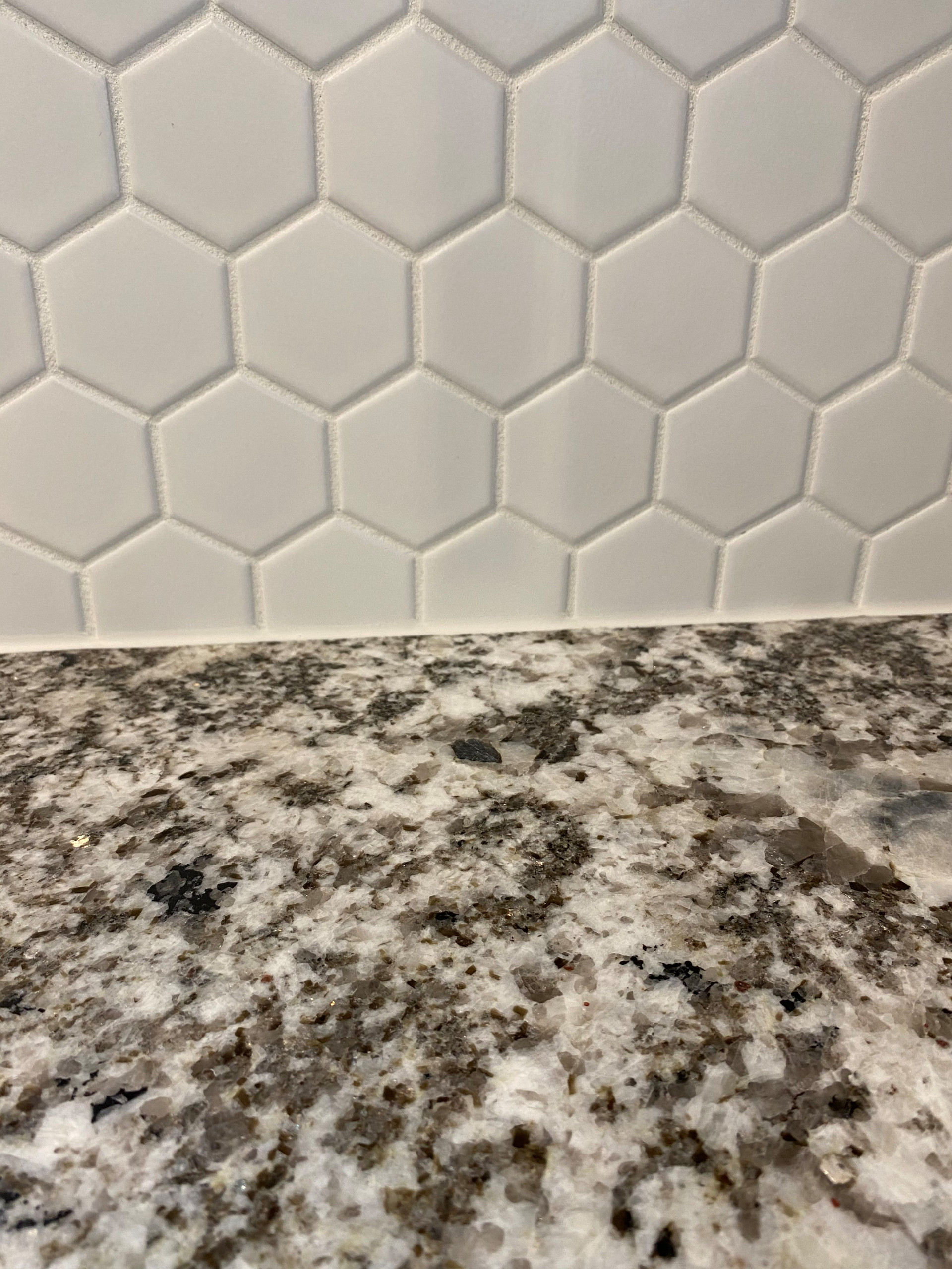 Backsplash and granite counter top