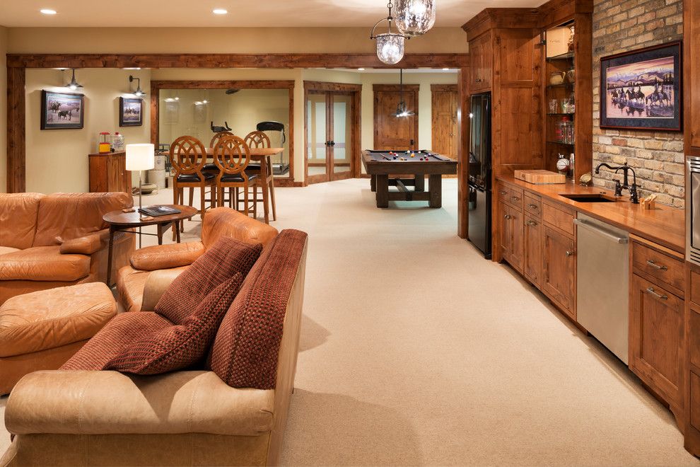 Inspiration for an expansive traditional fully buried basement in Minneapolis with a game room, beige walls, carpet, no fireplace and beige floor.