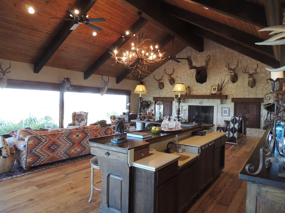 Living room - rustic living room idea in Austin