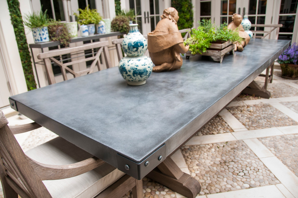 Patio - 90 to 99 inch, gray, 40 to 44 inch deep, 30 to 34 inch high and mid-sized rustic concrete and backyard stone patio idea in Miami with no cover