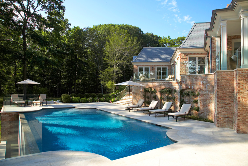 Traditional custom-shaped pool in New York.