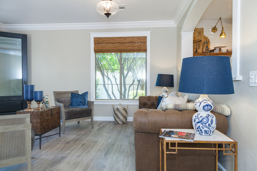 Inspiration for a large transitional porcelain tile and brown floor single front door remodel in Phoenix with beige walls and a dark wood front door
