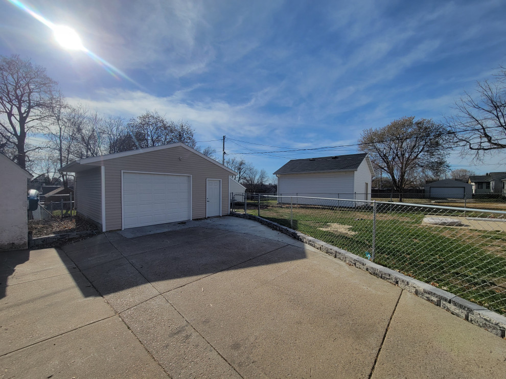 New Garage with Chain Link Fence
