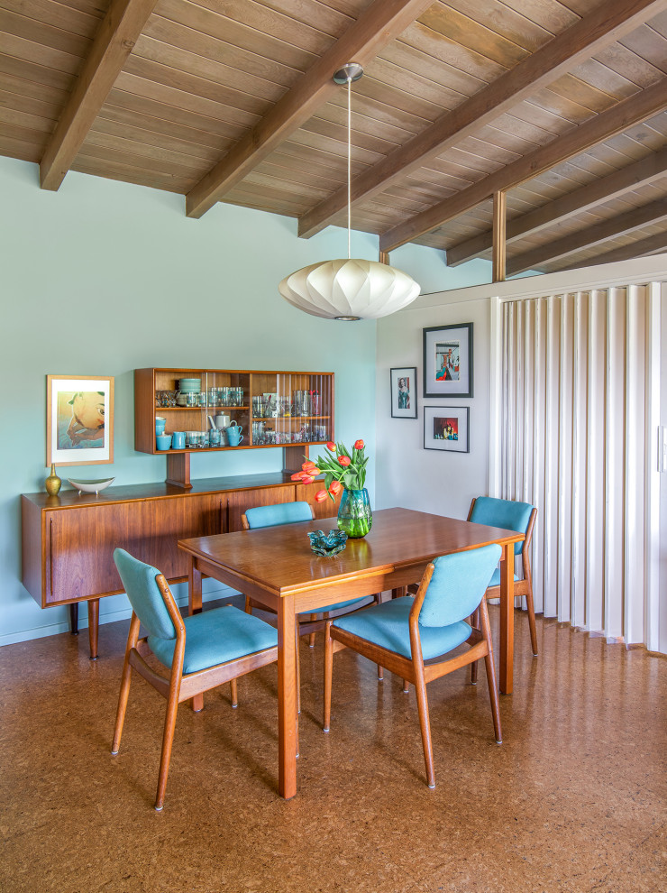 Example of a 1950s dining room design in Los Angeles