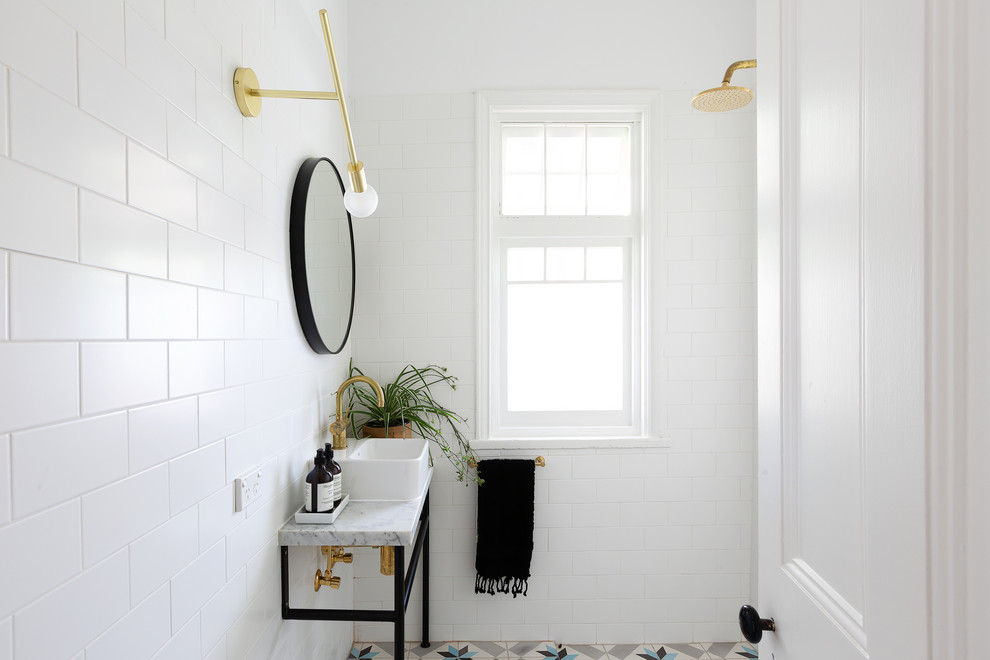 Inspiration for a transitional powder room in Sydney.