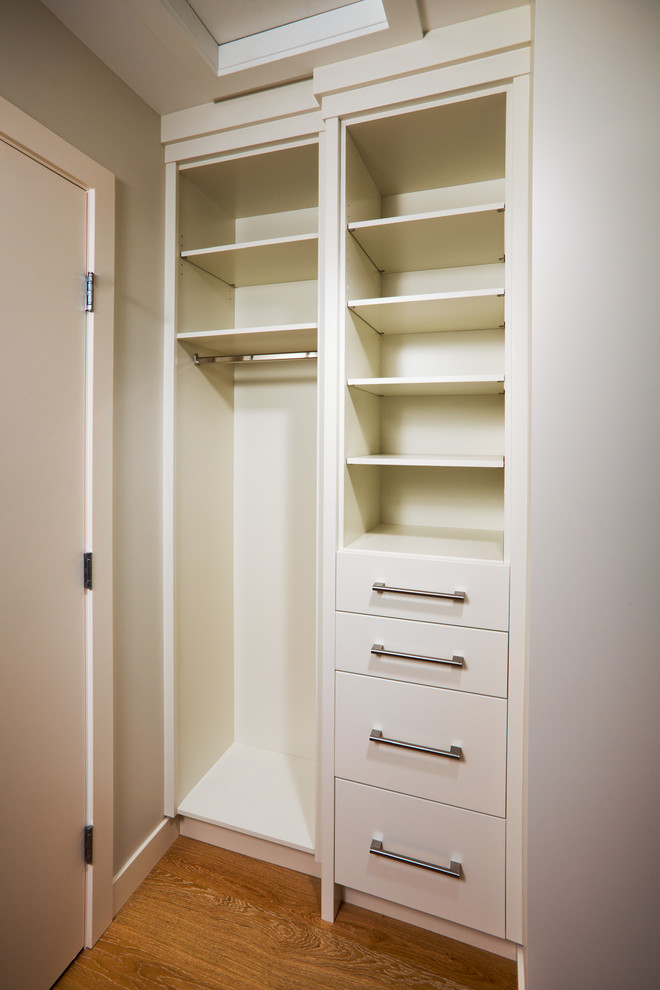 Inspiration for a modern storage and wardrobe in Calgary.