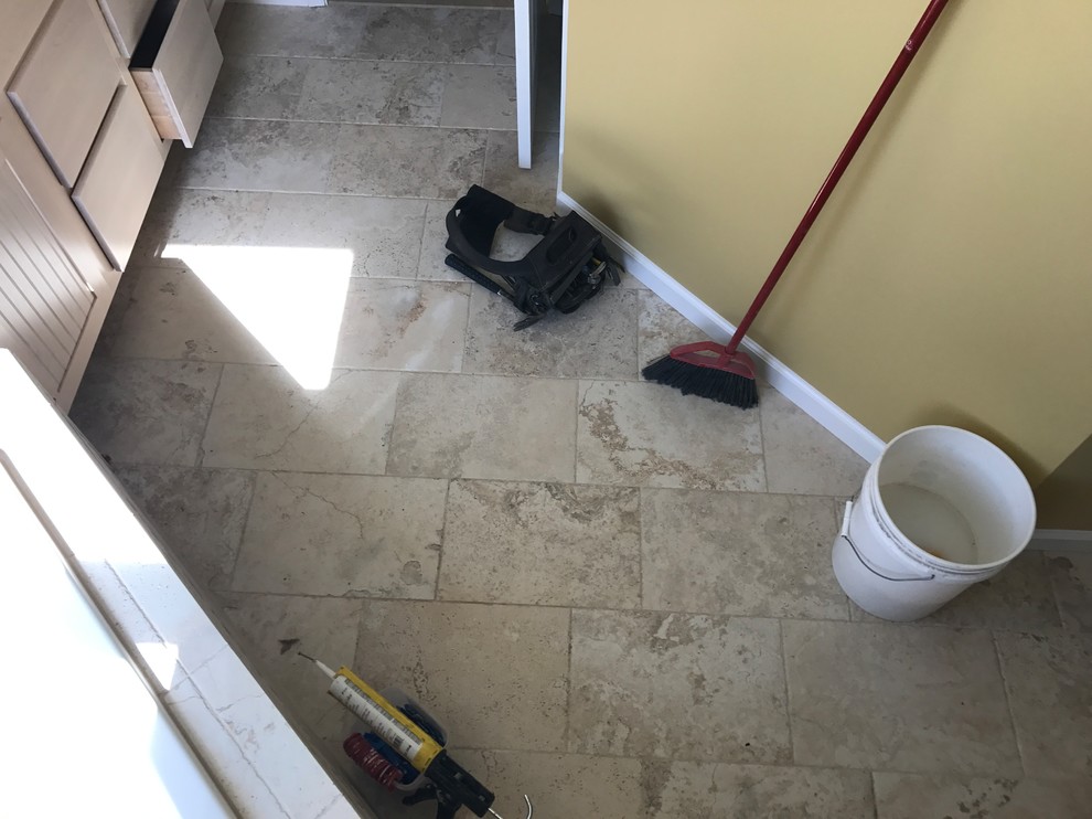 Corner bathtub - large traditional master beige tile and ceramic tile ceramic tile and beige floor corner bathtub idea in Baltimore with shaker cabinets, light wood cabinets, a two-piece toilet, yellow walls, an undermount sink, granite countertops and a hinged shower door