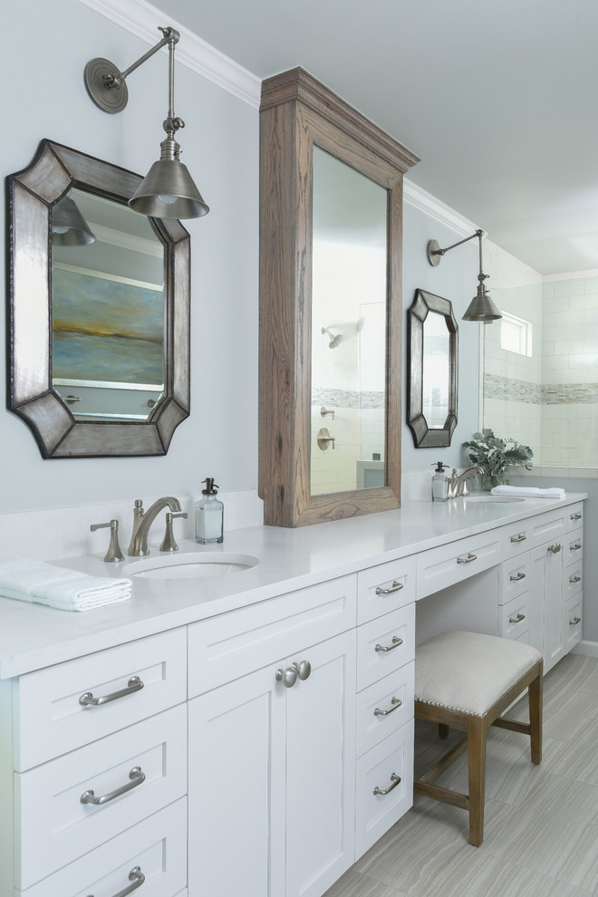 Mid-sized master bathroom in Dallas with a drop-in sink, shaker cabinets, white cabinets, engineered quartz benchtops, a freestanding tub, an open shower, a one-piece toilet, beige tile, stone tile, grey walls and travertine floors.