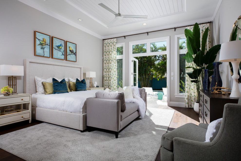 Design ideas for a transitional bedroom in Tampa with grey walls, dark hardwood floors and brown floor.