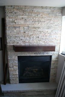 Stacked stone fireplace cost
