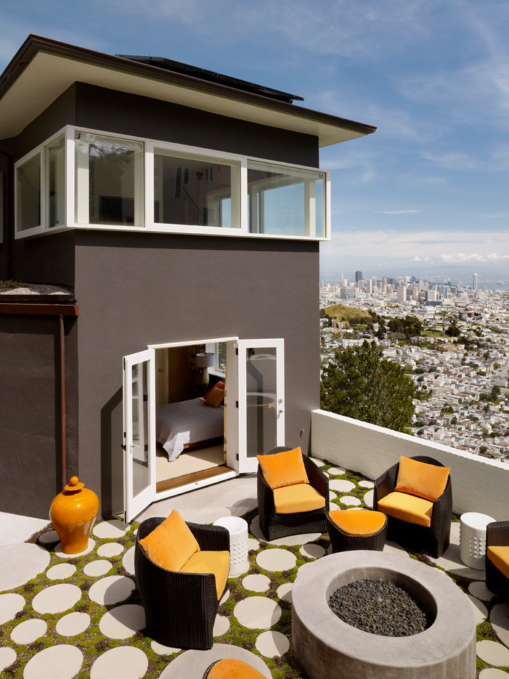 Inspiration for a contemporary patio in San Francisco with a fire feature and no cover.