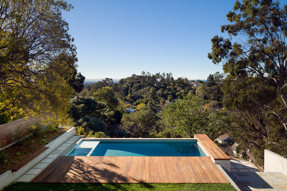 Mid-sized contemporary rectangular pool in Los Angeles.
