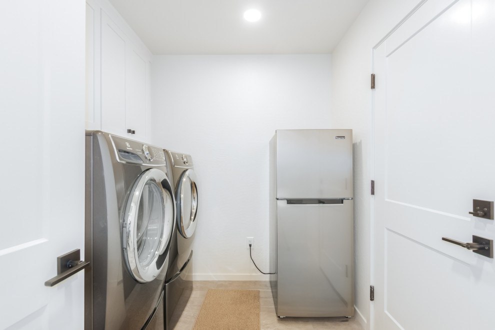 Example of a transitional laundry room design in Phoenix