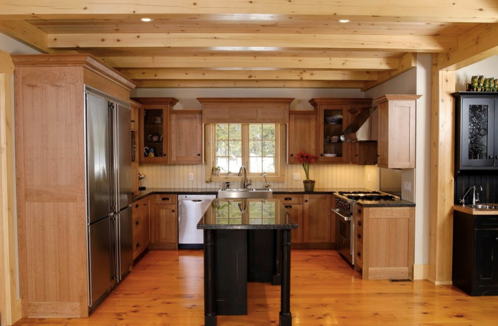 Large mountain style galley dark wood floor open concept kitchen photo in Boston with an undermount sink, shaker cabinets, white cabinets, granite countertops, stainless steel appliances and an island